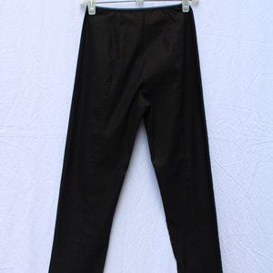 Black Mesmerize pants with a golden shift